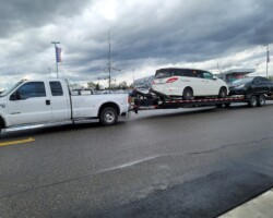 2 car hauling Menas Towing Log Distance Towing Service